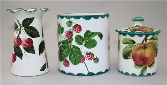 A Wemyss preserve pot and cover, a similar vase and a cylindrical pot, early 20th century, 12cm, preserve cover with restorations